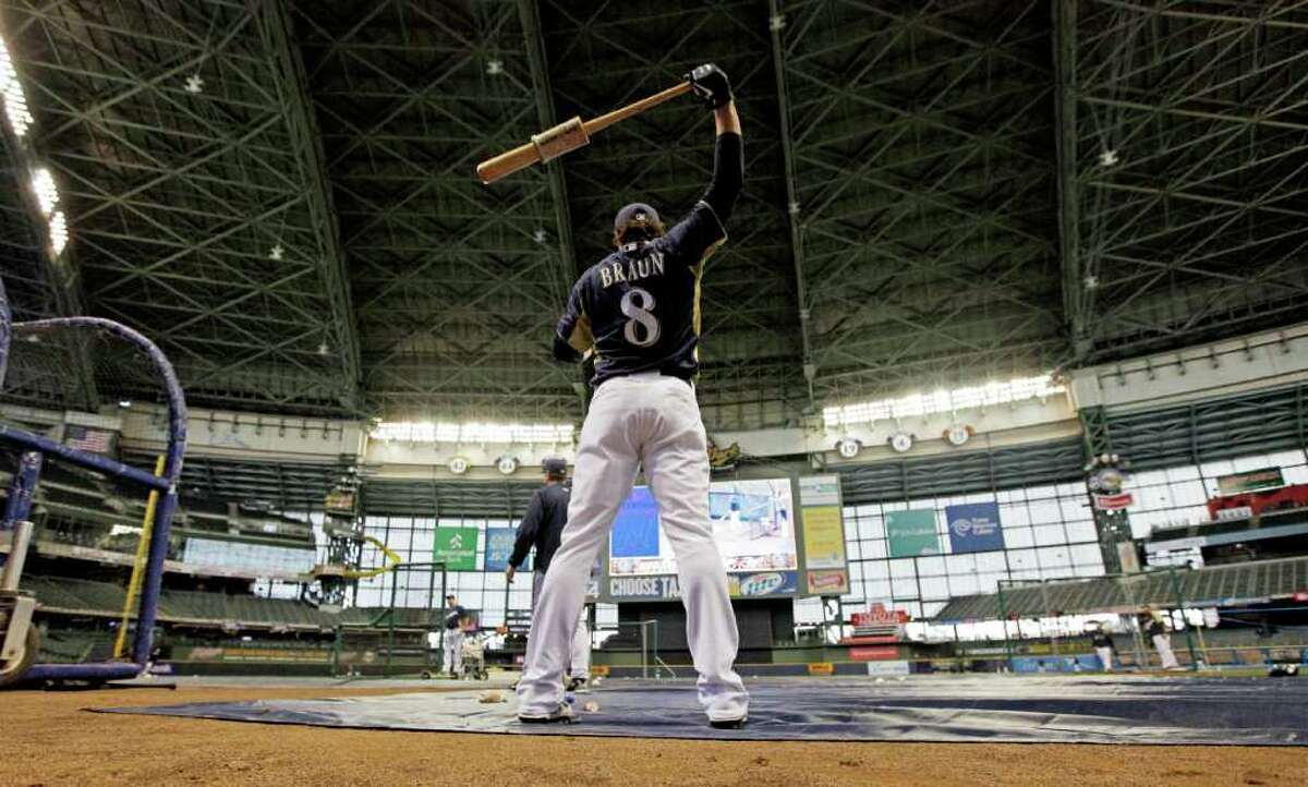 Milwaukee Brewers' Ryan Braun stretches during baseball practice, Friday, Sept. 30, 2011, in Milwaukee. The Brewers are scheduled to face the Arizona Diamondbacks in Game 1 of the National League division baseball series on Saturday. (AP Photo/David J. Phillip)