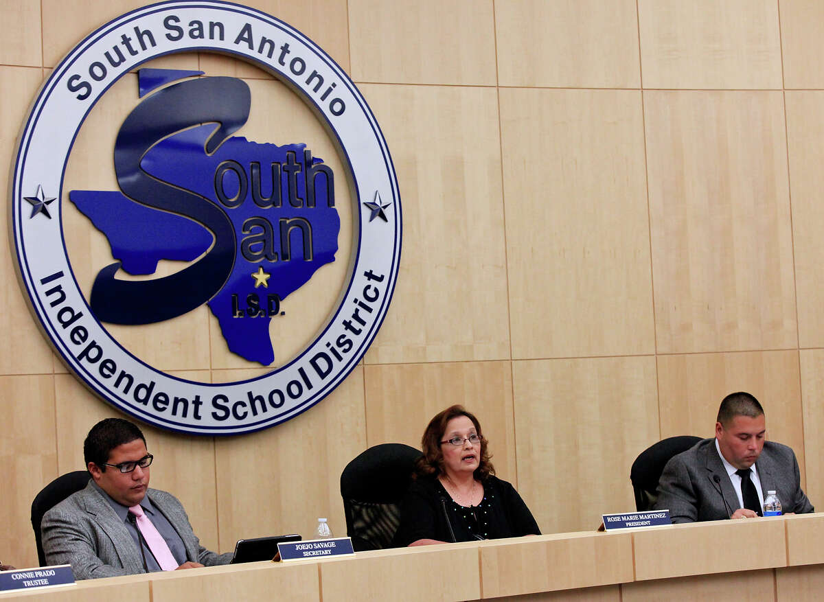 South San Antonio Independent School District Board of Trustees President Rose Marie Martinez (center) speaks during a South San ISD Board of Trustees special called meeting to discuss the selection of an interim superintendent Monday July 22, 2013 at South San ISD headquarters. Mourette Hodge was named interim superintendent. South San ISD Board of Trustees Secretary JoeJo Savage is pictured at left and Vice President Carlos G. Longoria is at right.