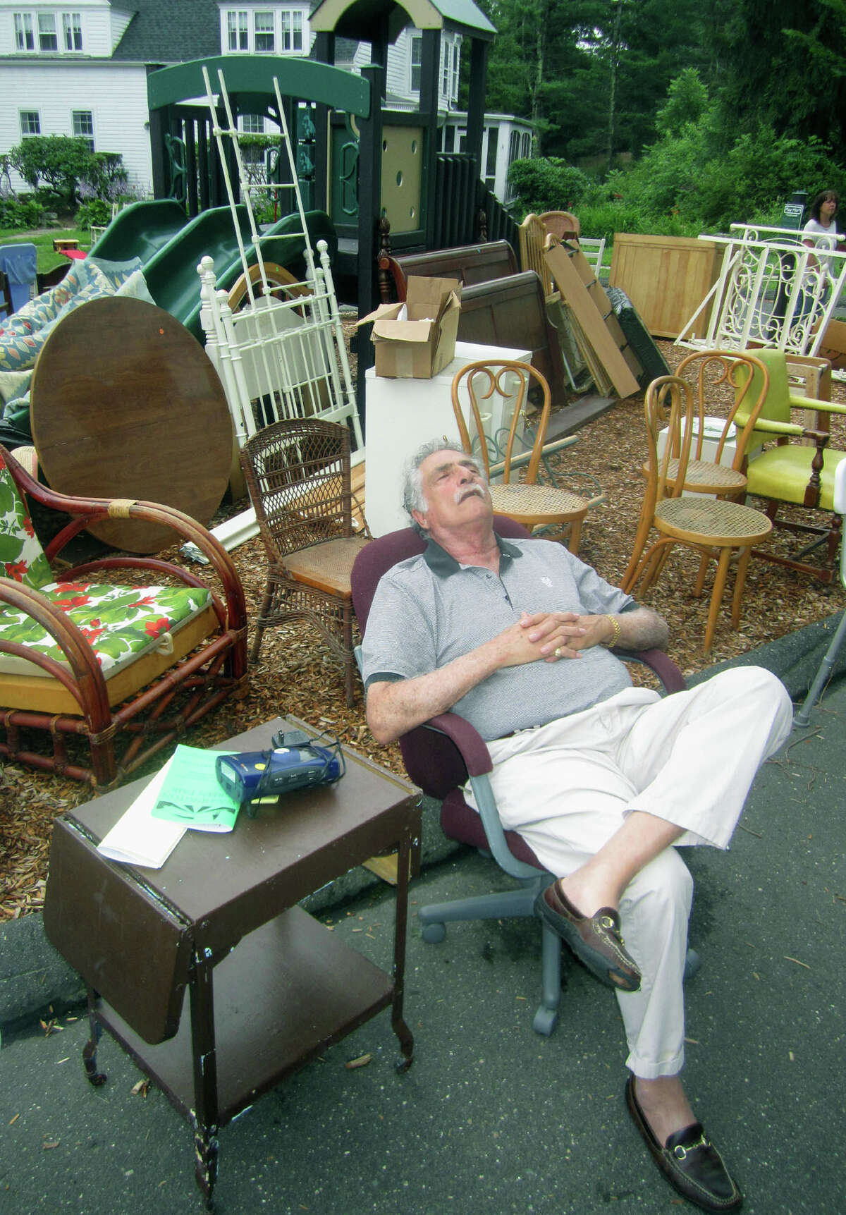 The pace of the Washington Congregational Church's annual Green Fair proves a bit too much for at least one visit, July 13, 2013.