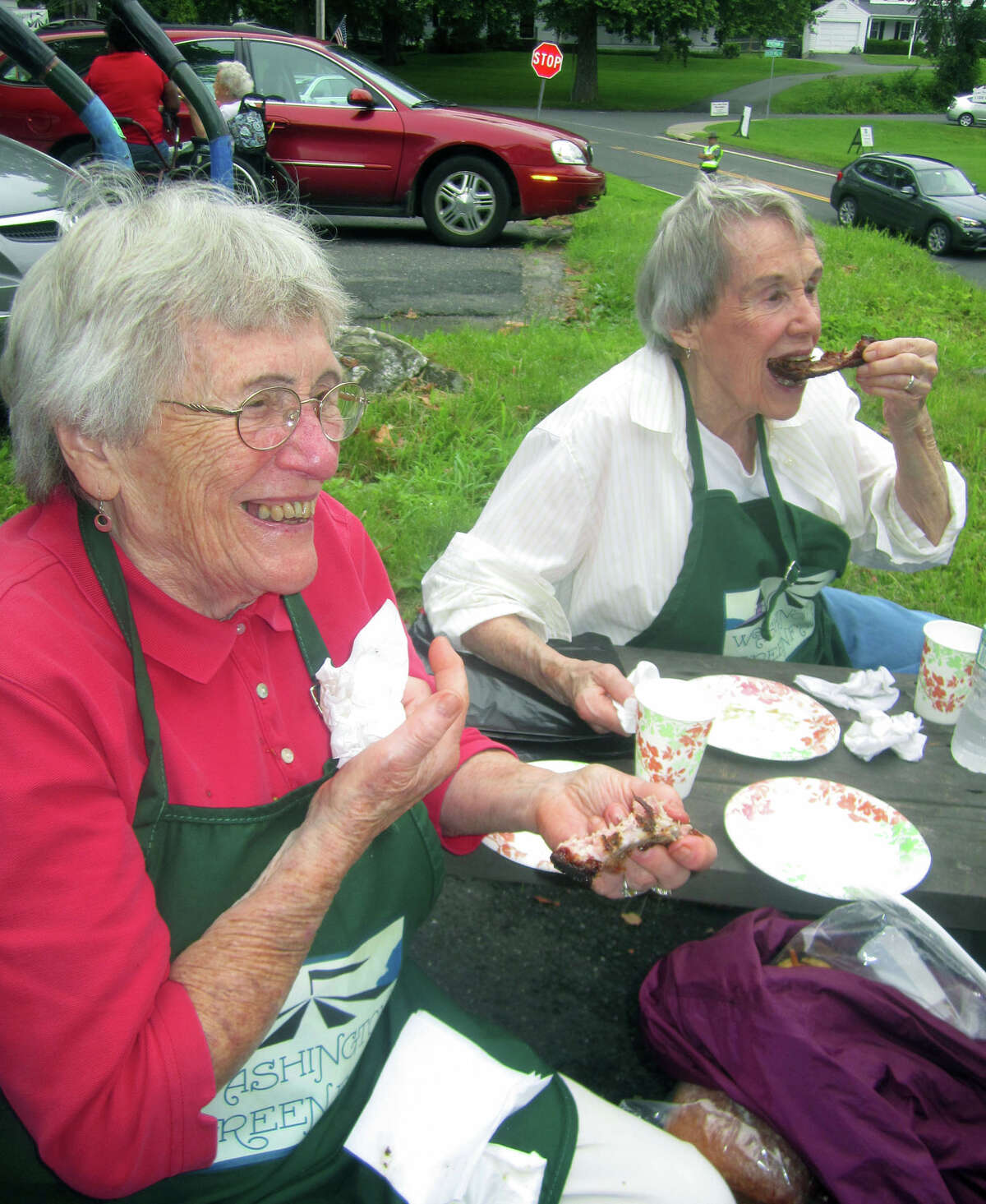 Forever young church volunteer Norma Anson, 89, and her sister, Mary Rivers, 87,take a quick break to grab lunch during the Washington Congregational Church's annual Green Fair, July 13, 2013. The sisters were baptized in the church more than a few fortnights ago.