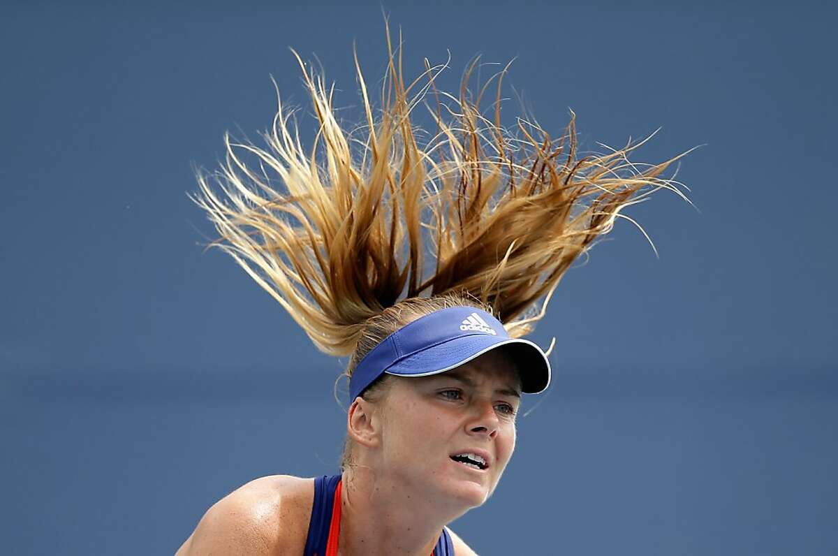 STANFORD, CA - JULY 23: Daniela Hantuchova of Slovakia serves to Yanina Wickmayer of Belgium during their match on Day 2 of the Bank of the West Classic at Stanford University Taube Family Tennis Stadium on July 23, 2013 in Stanford, California. (Photo by Ezra Shaw/Getty Images)