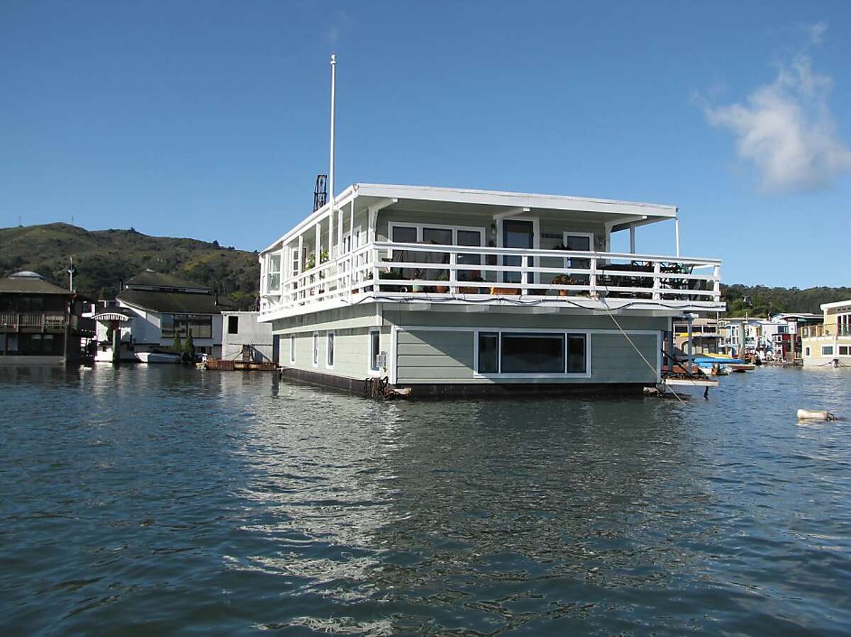 Restored Sausalito houseboat with decks, views