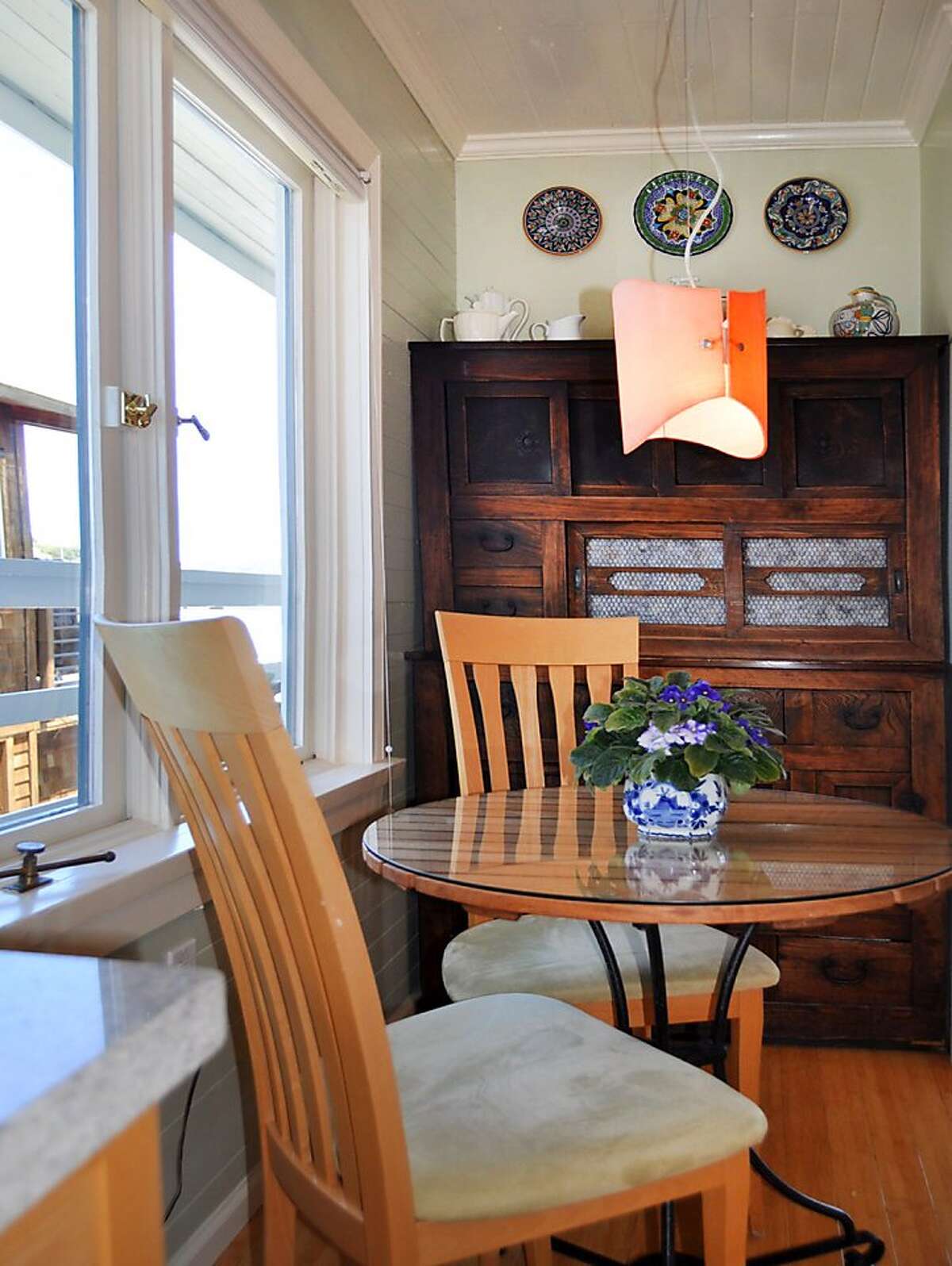 Restored Sausalito houseboat with decks, views