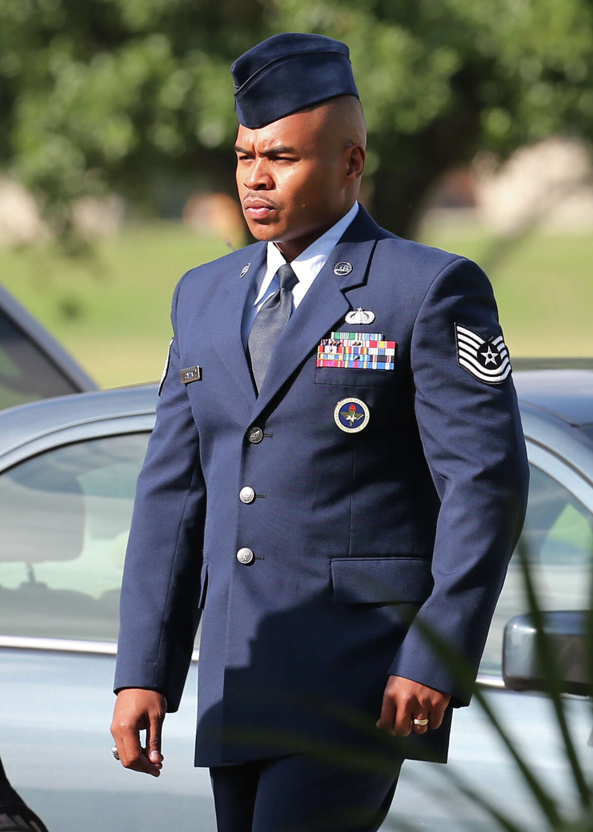 Tech. Sgt. Marc Gayden arrives at Lackland Air Force Base for his trial on sodomy and rape charges, Tuesday, July 23, 2013.