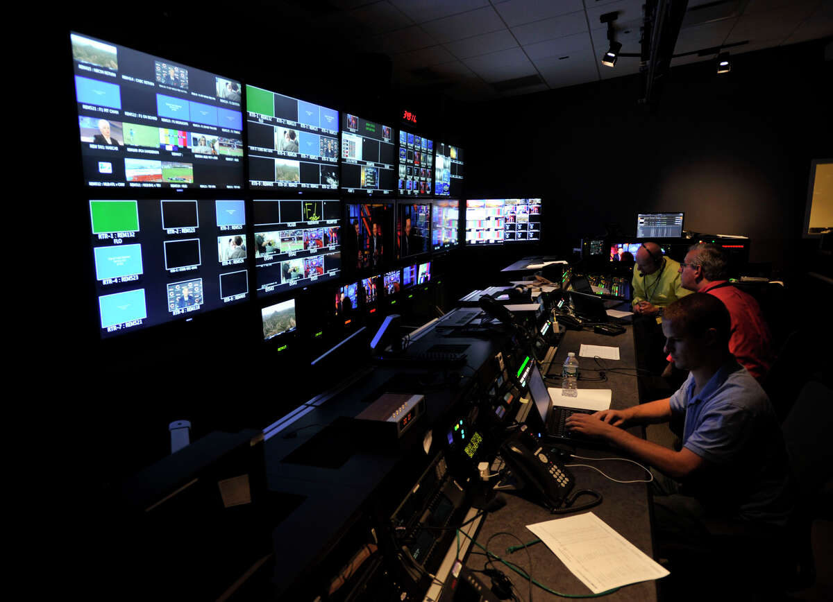 People work in a production control room during the grand opening of the NBC Sports Group facility in Stamford on Wednesday, July 24, 2013.