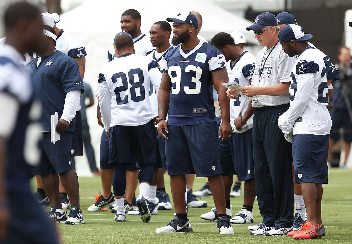 Injured defensive end Anthony Spencer (93) watches practice during the morning session of the 2013 Dallas Cowboys training camp on Wednesday, July 24, 2013 in Oxnard.