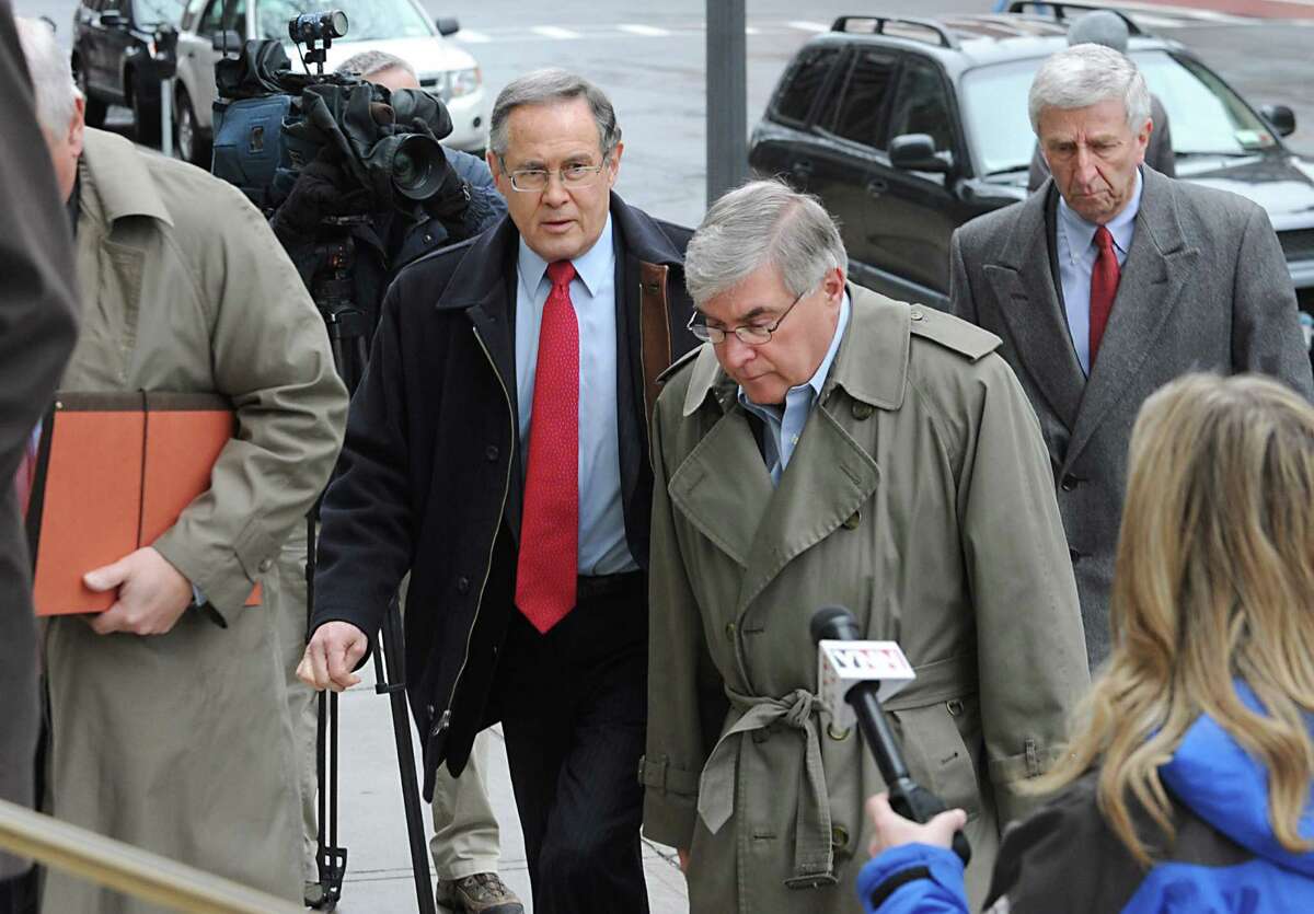 From left, Attorneys William Dreyer and E. Stewart Jones arrive to the U.S. District Courthouse with their clients Timothy McGinn and David Smith Friday Jan. 27, 2012 in Albany, N.Y. (Lori Van Buren / Times Union)