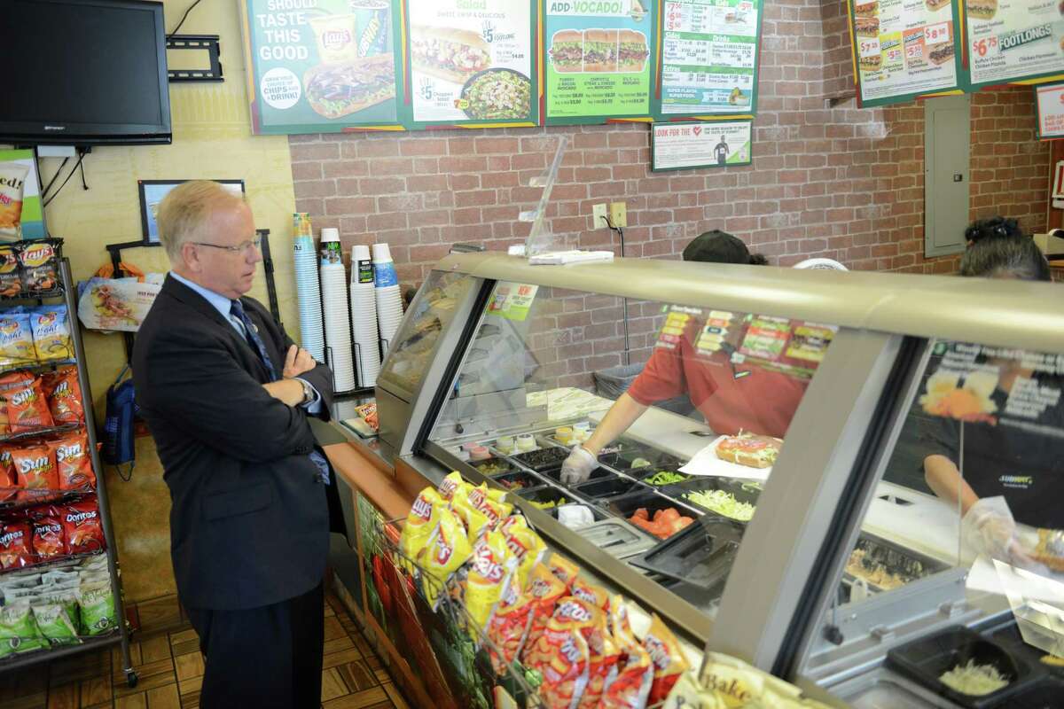 Danbury Mayor Mark Boughton grabs a bite to eat at Subway in Danbury, Conn. on Wednesday, July 17, 2013.