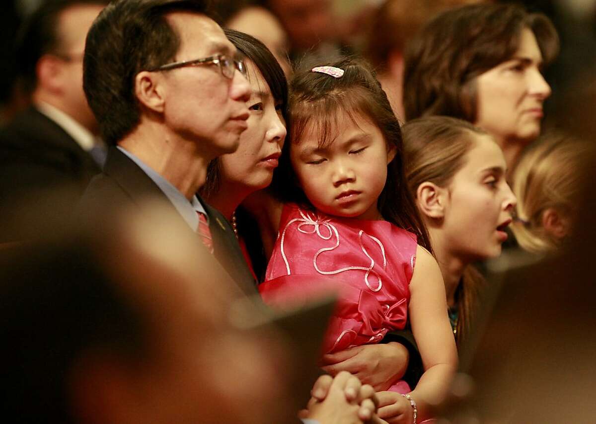 Caitlyn Chau had trouble keeping her eyes open as details were discussed about the new Assembly. Her father Assemblyman Ed Chau and mother Candice sat with her. The new California legislature was sworn in during a ceremony Monday December 3, 2012 at the state capitol at the Assembly chambers in Sacramento, Calif.