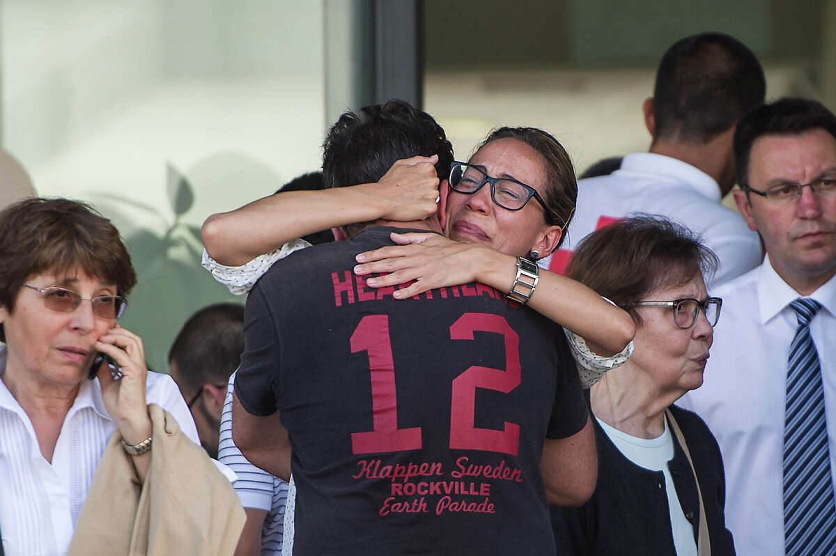 Relatives of passengers involved in the train crash wait for news at the Cersia Building on July 25, 2013 in Santiago de Compostela, Spain. The crash occurred as the train approached the north-western Spanish city of Santiago de Compostela at 8.40pm on July 24th, at least 77 people have died and a further 131 reported injured. The crash occured on the eve of the Santiago de Compostela Festivities.