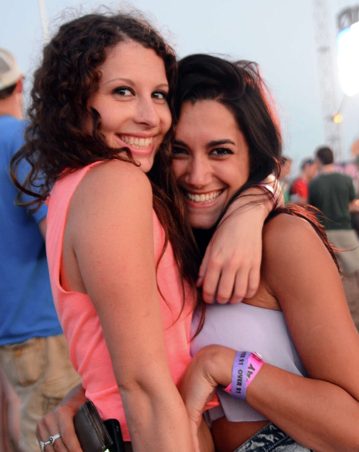 Jena Wright, left, and her friend Bronte Uccellini enjoy the 18th Annual Gathering of the Vibes music festival at Seaside Park in Bridgeport, Conn. on Friday July 27, 2013.