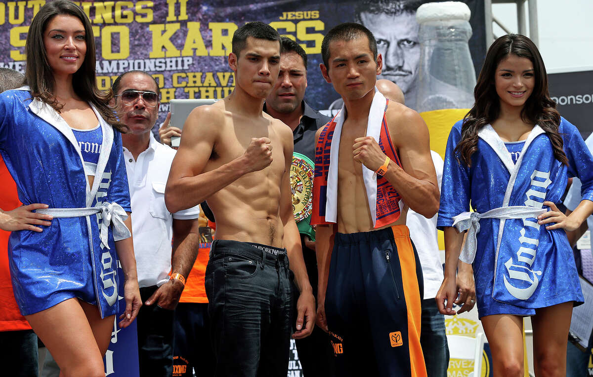 Omar Figueroa, Jr. (left) and Nihito Arakawa pose during the Knockout Kings II fight card weigh-in at the H.E.B. parking lot at 6818 South Zarzamora on July 26, 2013.