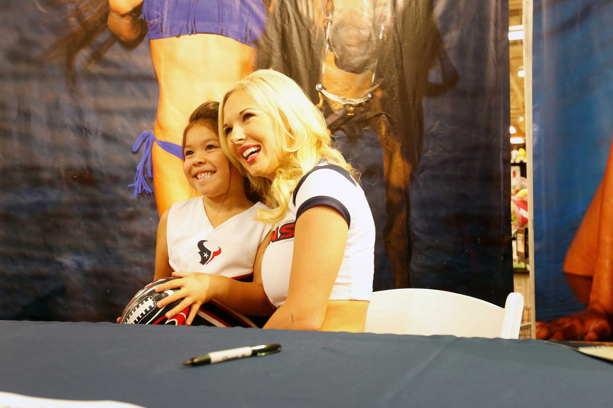 Houston Texans Cheerleaders swimsuit calendar signing