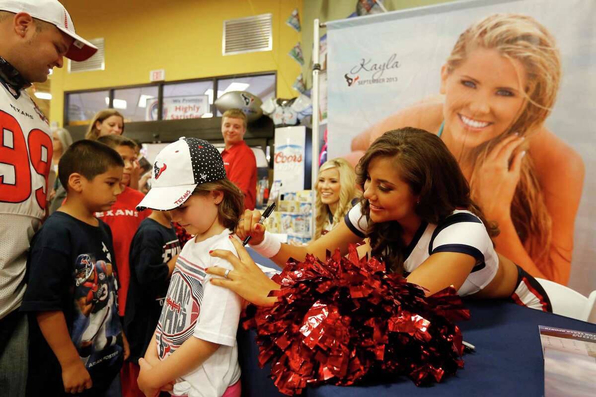 Houston Texans Cheerleaders swimsuit calendar signing