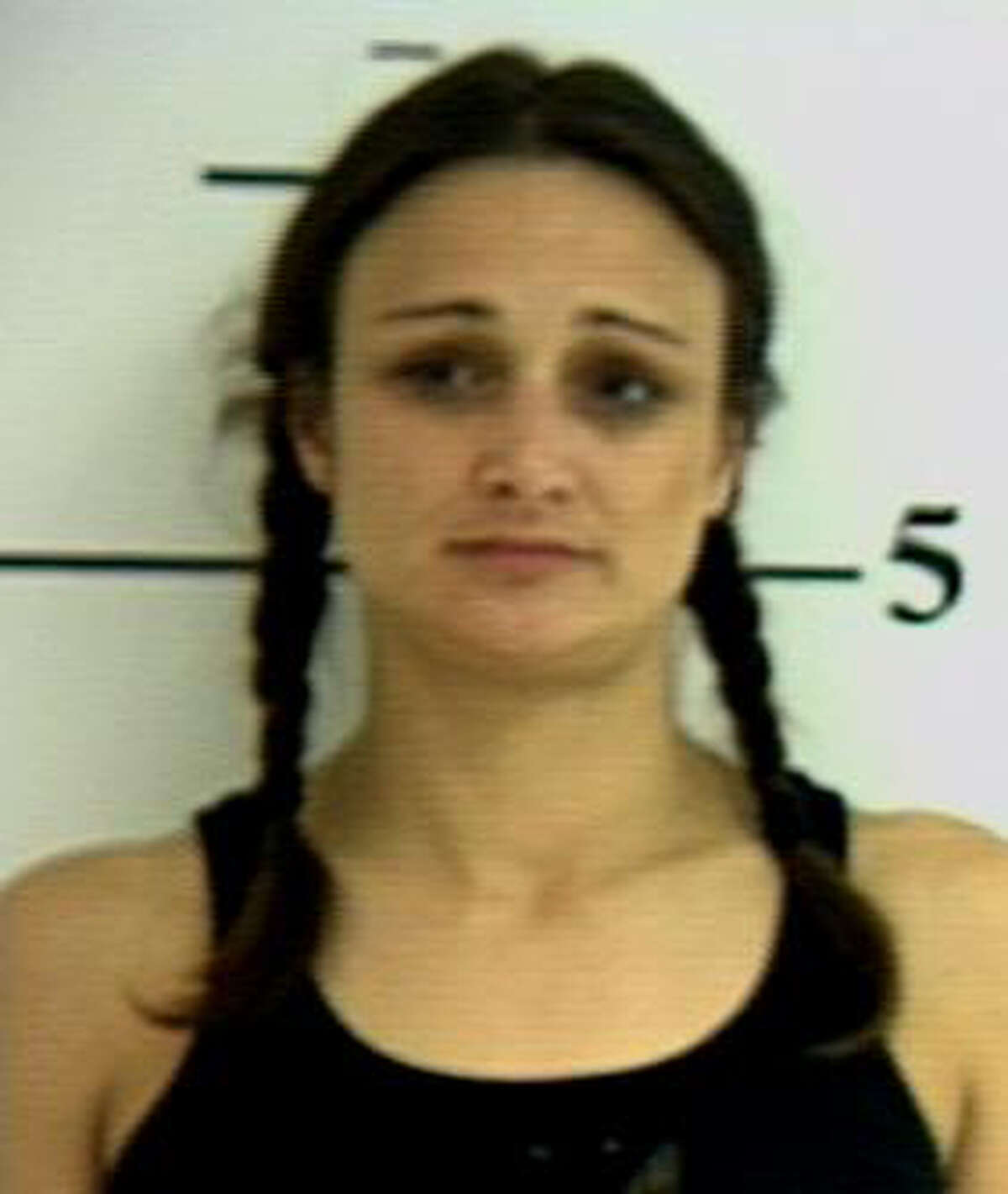 Carrie Wood mugshot, as taken in 2007 by the Angelina County Sheriff's Office. She was later convicted for her role in the death of an Aryan Brotherhood of Texas member and his girlfriend.