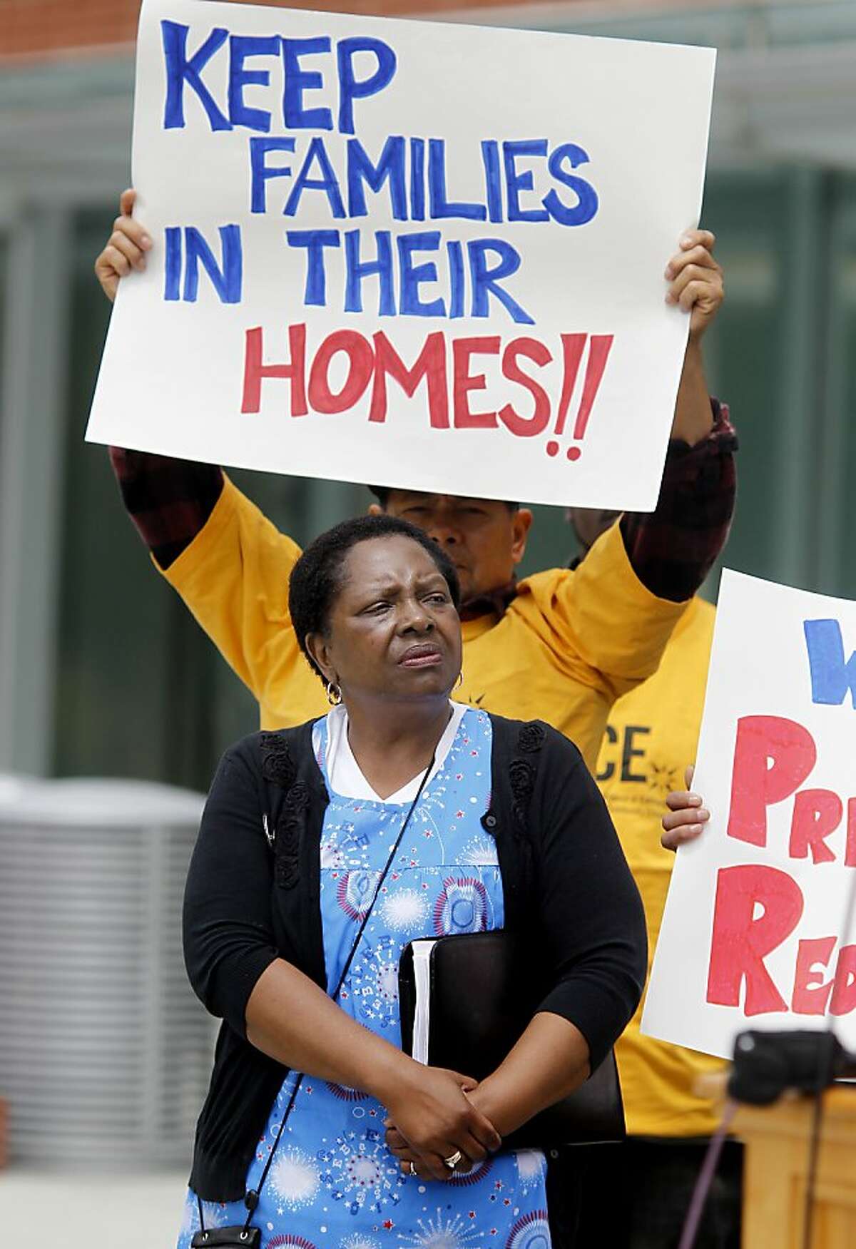Doris Ducre, whose home is less more than the mortgage, spoke briefly of her plight Tuesday July 30, 2013. The city of Richmond, Calif. is teaming with private investors to buy up over 600 mortgages in the city from large banks to help homeowners redo their loans so they can stay in their homes.