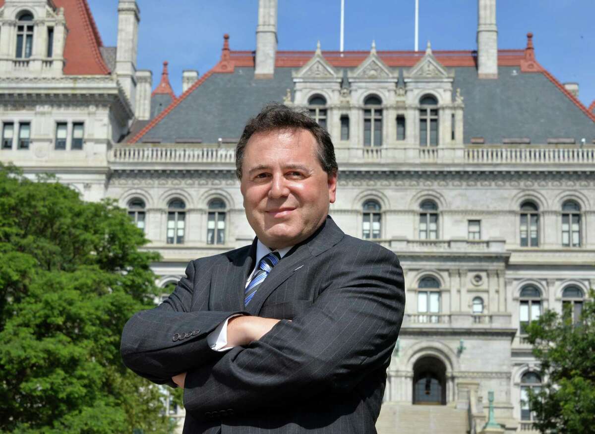 College of Saint Rose professor Bruce Roter in front of the Capitol in Albany, NY, Wednesday July 31, 2013. (John Carl D'Annibale / Times Union)