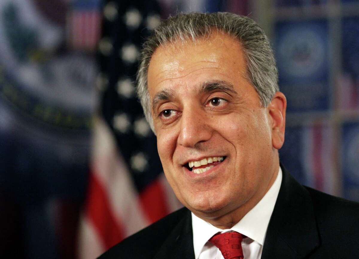 Zalmay Khalilzad speaks during an interview in Baghdad, Iraq in this Sunday, May 21, 2006 file photo. Khalilzad says a resolution that would expand the U.N. mandate in Iraq will internationalize the effort to assist Iraqis in overcoming their internal differences and bringing neighboring countries together to help the country. (AP Photo/Hadi Mizban, FILE)