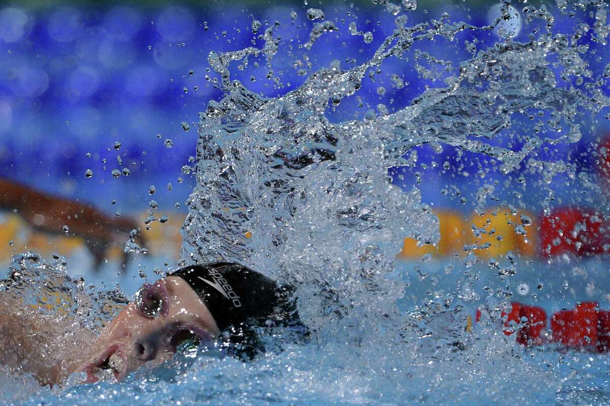 American Missy Franklin cuts through the water during the women's 200-meter freestyle at the world championships Wednesday. She won her third gold in 1 minute, 54.81 seconds.