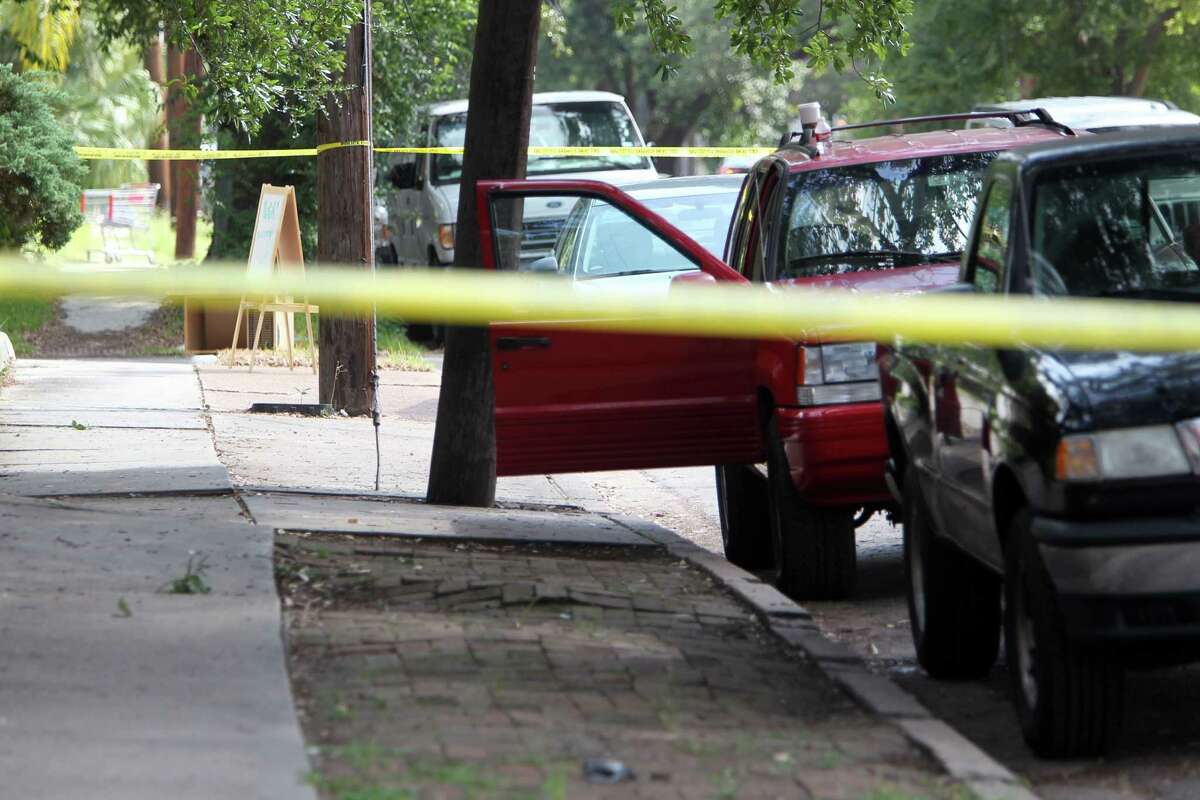 HPD investigates a double shooting outside the Caroline Collective where three suspects approach the CC employee standing next to his red vehicle and ask for his money. He shot one of the robbers and injured another, and the third suspect is on the loose on Thursday, Aug. 1, 2013, in Houston.