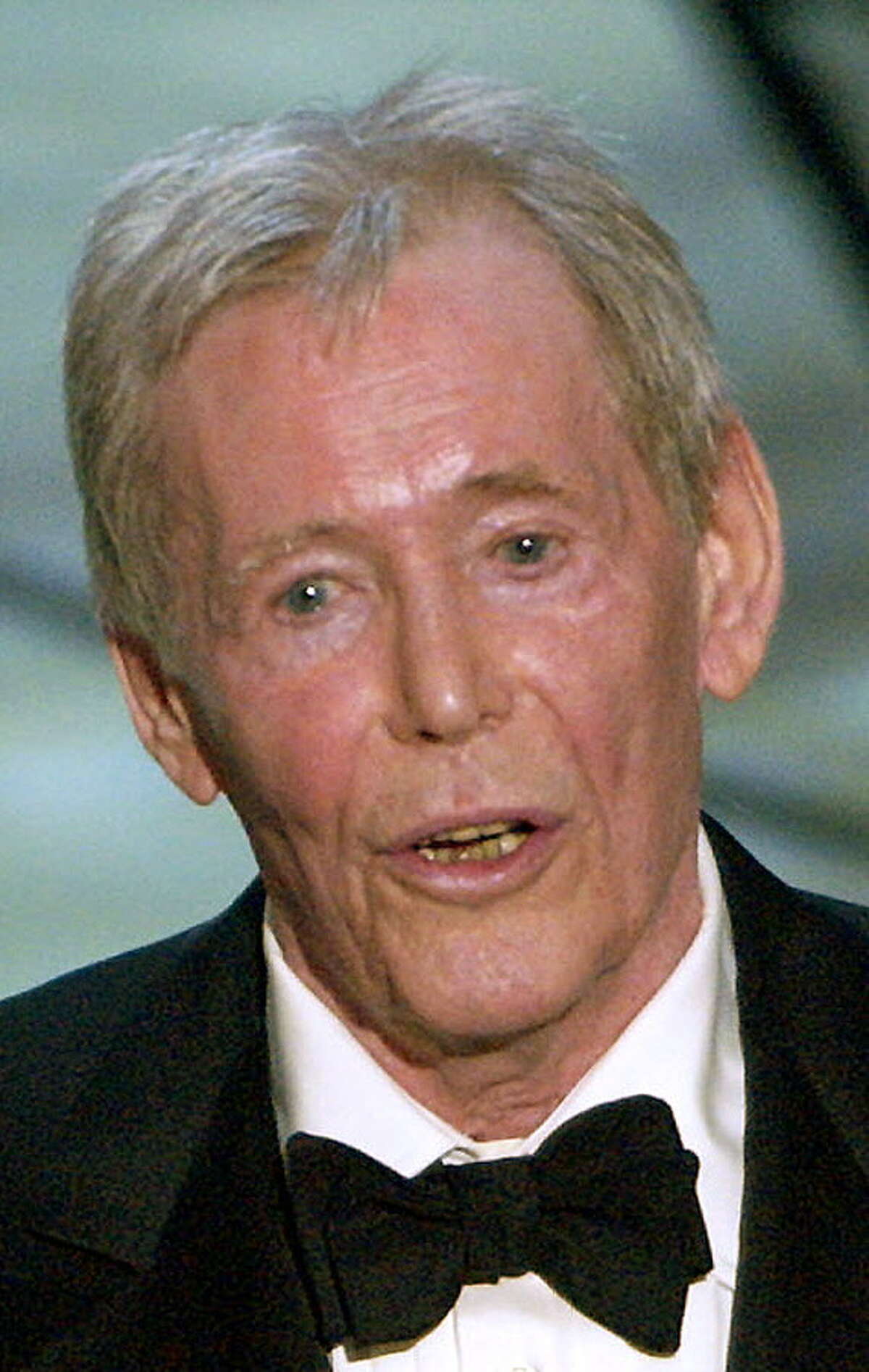 **FILE**Actor Peter O'Toole accepts his honorary Oscar from the Academy of Motion Picture Arts and Sciences during the 75th annual Academy Awards telecast on March 23, 2003, in Los Angeles. O'Toole, a seven-time Oscar nominee, will star in "Lassie," a new adaptation of the 1938 novel "Lassie Come Home" by Eric Knight. Shooting was to begin Monday, May 23, 2005, on location in Ireland and the Isle of Man.(AP Photo/Kevork Djansezian)