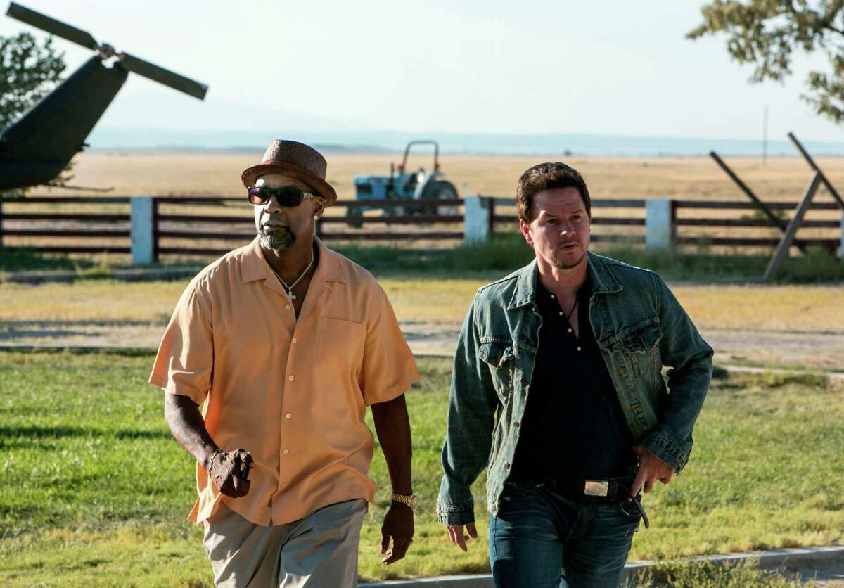 Denzel Washington, left, and Mark Wahlberg team up in the action-thriller "2 Guns."
