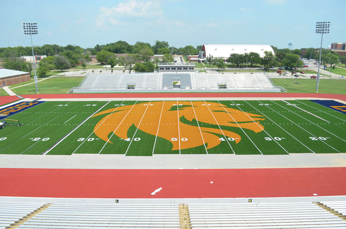 Orange is the new green at Texas A&M-Commerce, where the school's resurfaced field features a Lions head logo that measures 50 yards by 50 yards.