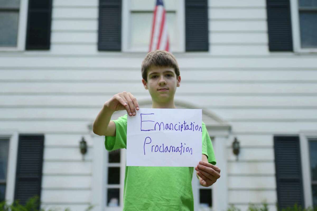 Thomas Hurley III, poses for a photo outside his home in Newtown, Conn. on Friday, August 2, 2013. The 12-year-old recently appeared on Jeopardy, spelling "Emancipation Proclamation" incorrectly, adding an extra "T," during Final Jeopardy. The judges disqualified Hurley's answer, despite show host Alex Trebek reading it correctly, costing him $3,000.