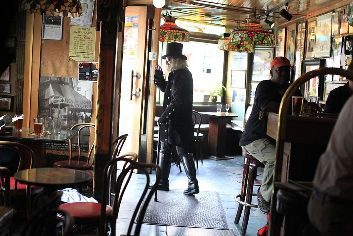 Before the evening crowds show, Patrick "Captain Cool" LeBold makes his exit at Vesuvio Cafe in North Beach.
