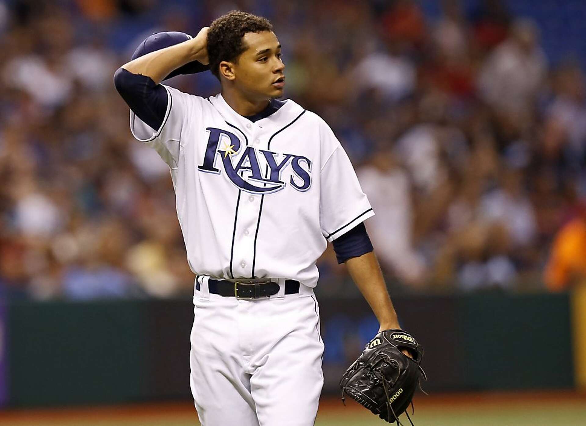 Belt's bat re-emerges to lift Giants over Rays