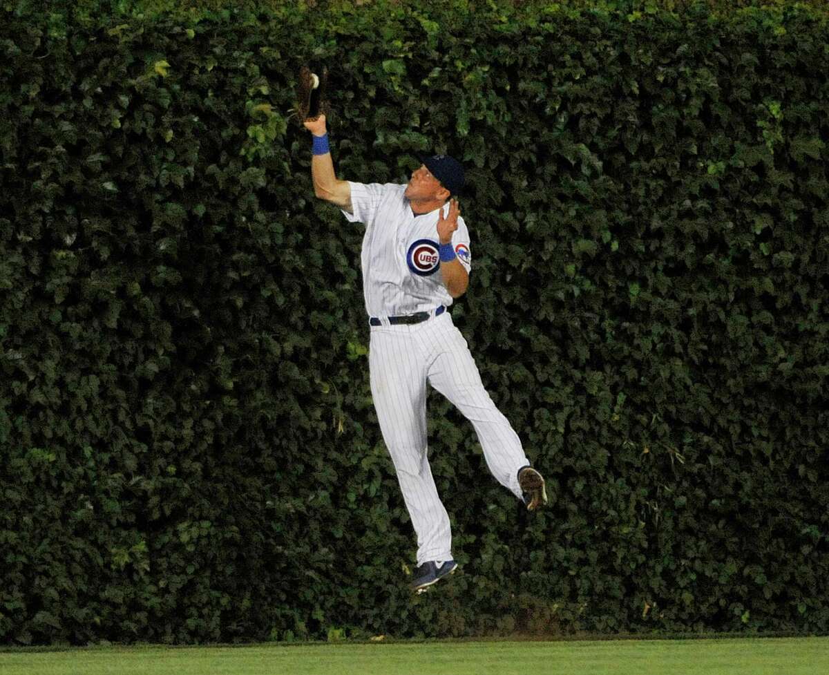 Cubs pitcher, Matt Garza upset with the call ball four with the bases  News Photo - Getty Images