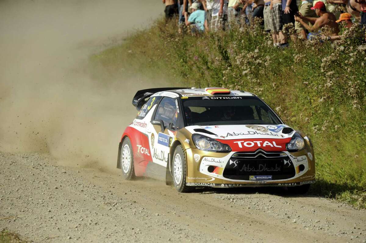 Spain's Daniel Sordo in action at the special stage of the the FIA World Rally Championship WRC Neste Oil Rally Finland in Leustu, Finland, Saturday, Aug. 3, 2013. (AP Photo/ Mikko Stig, Lehtikuva) FINLAND OUT