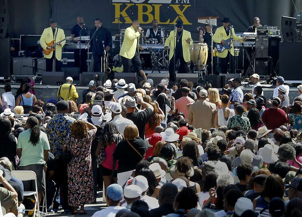 ConFunkShun had much of the crowd on their feet Sunday August 4, 2013. The 13th annual Art and Soul street party in Oakland, Calif. attracted crowds to the music, crafts, a children's ride area, and a wide choice of cuisine.