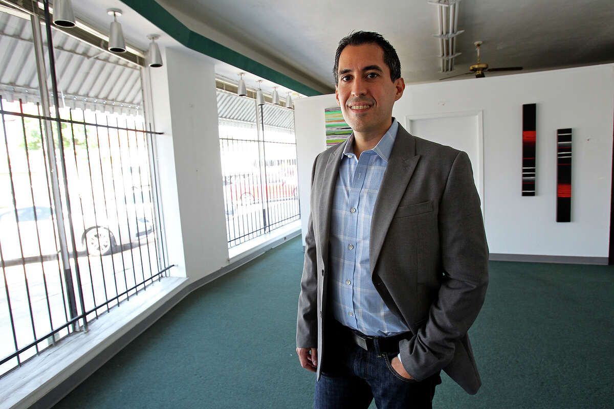 Richard Farias, board chairman of the Pride Center, stands in the new facility location on July 31, 2013.