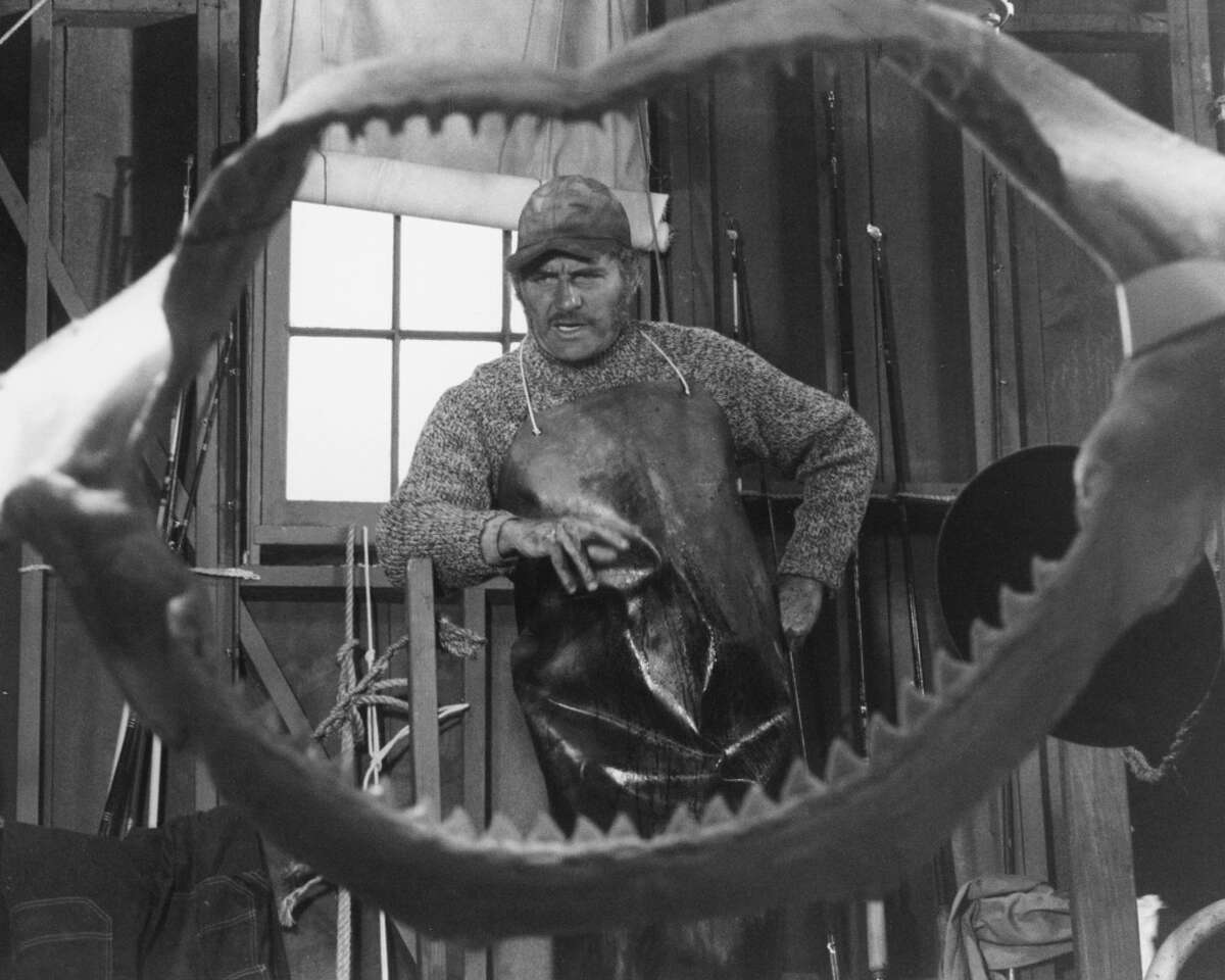 (1927 - 1978) as Quint, viewed through a set of shark jaws, in a publicity ...