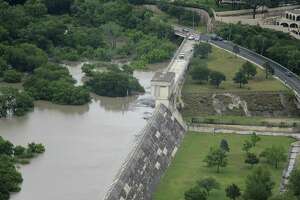 The Olmos Dam holds back flood waters after heavy rains in San Antonio on May 25.