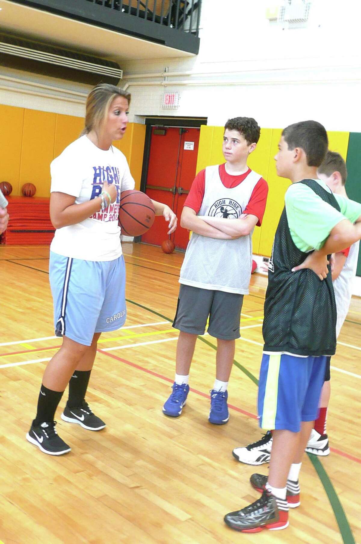 Former Greenwich High School and Wheaton College hoop star Jana Jagodzinski wants to keep her hand in the game she loves so she worked this summer coaching at the High Rise Academy basketball camp, which was held at Eagle Hill School. "I absolutely love coaching the kids at High Rise Basketball Camp," she says.