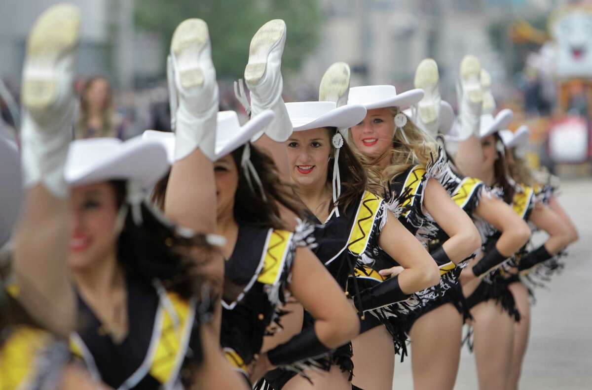 Drill team members perform during the 62nd Annual Holiday Parade on Thanksgiving Day in 2011.