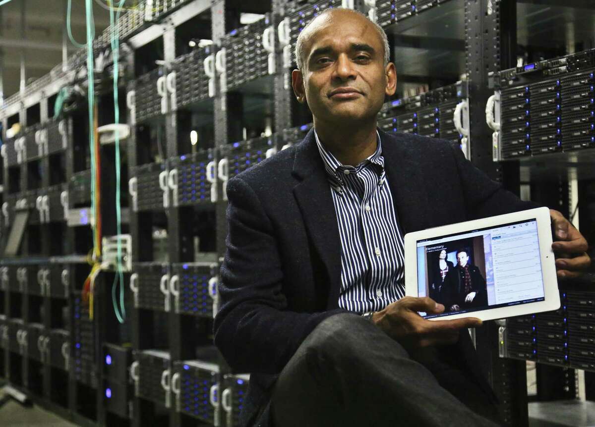 In this Thursday, Dec. 20, 2012, photo, Chet Kanojia, founder and CEO of Aereo, Inc., shows a tablet displaying his company's technology, in New York. Aereo is one of several startups created to deliver traditional media over the Internet without licensing agreements. Past efforts have typically been rejected by courts as copyright violations. In Aereo’s case, the judge accepted the company’s legal reasoning, but with reluctance. (AP Photo/Bebeto Matthews)
