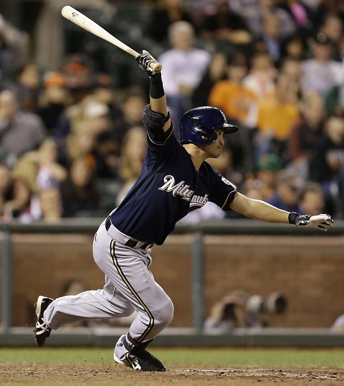Milwaukee Brewers' Norichika Aoki, of Japan, swings for a two run single off San Francisco Giants' Santiago Casilla in the eighth inning of a baseball game Wednesday, Aug. 7, 2013, in San Francisco. (AP Photo/Ben Margot)