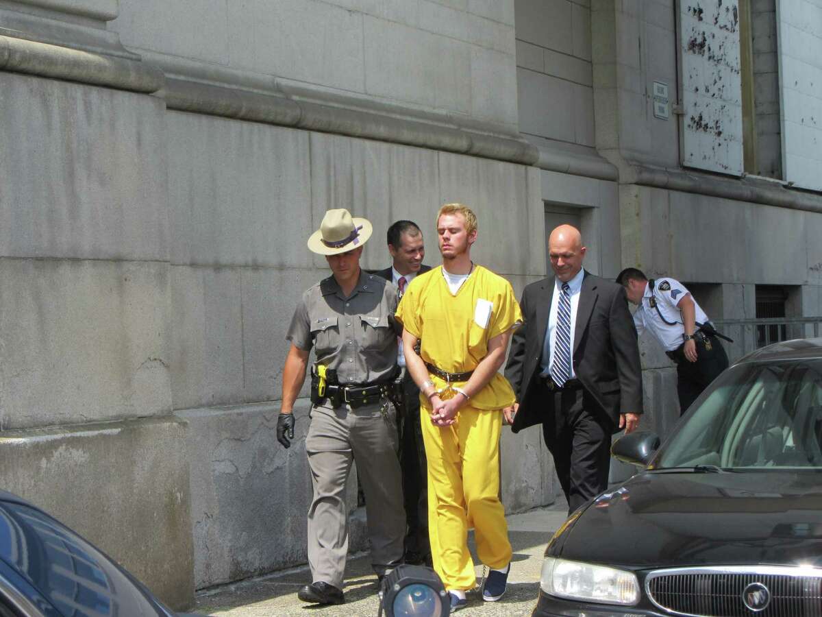 A state trooper leads Anthony Repp, in jail clothing, from the Rensselaer County Courthouse on Thursday, Aug. 8, 2013. (Bob Gardinier/Times Union)