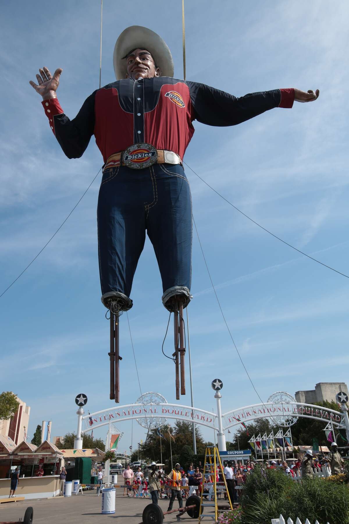 Workers raise Big Tex for his 60th time for the Texas State Fair at Fair Park in Dallas September 24, 2012. (Nathan Hunsinger/ The Dallas Morning News)