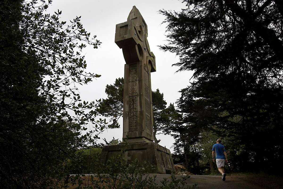 One can approach the Prayerbook Cross from a path off John F. Kennedy Drive Thursday August 8, 2013. The 57 foot high Celtic cross called Prayerbook Cross is one of the few surviving relics of the Midwinter Exposition of 1894. It stands next to the top of Rainbow Falls in San Francisco's Golden Gate Park.
