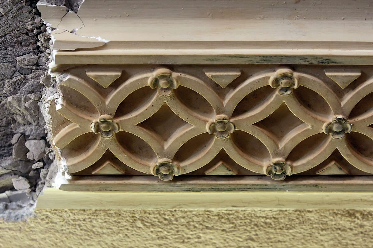 An ornate plaster molding from 1926 was uncovered in a courtroom at the Bexar County courthouse. The building is in the process of being restored to its near-original design from the 1800s. With public and private funding, architects and historians have uncovered some of the building's original architecture and will work to restore the courthouse at a future date.