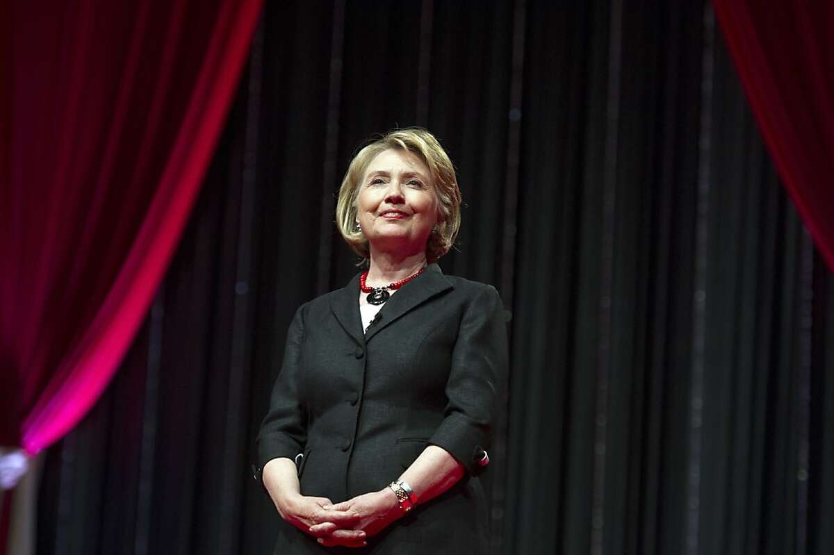 Former Secretary of State Hillary Rodham Clinton addresses the 51st Delta Sigma Theta National Convention in Washington, Tuesday, July 16, 2013. Clinton is offering her prayers for the family of Trayvon Martin and, in her words, "every family who loves someone who is lost to violence." Clinton says this week has brought "deep, painful heartache" to many Americans. She said no mother or father should ever have to fear for a child walking down a street in the United States. (AP Photo/Cliff Owen)