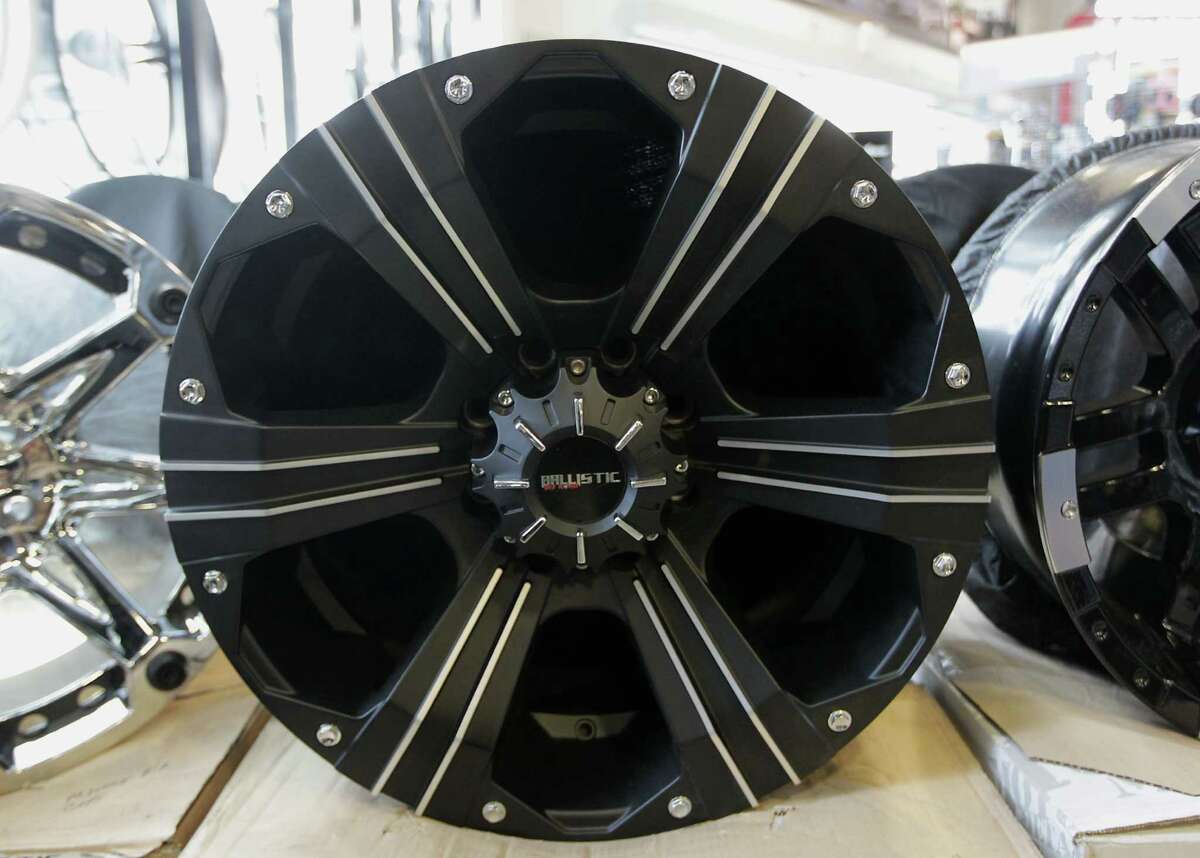 A black Ballistic wheel at the American Wheel and Tire store in the 11000 block of Northwest Freeway Wednesday, Aug. 7, 2013, in Houston. ( James Nielsen / Houston Chronicle )