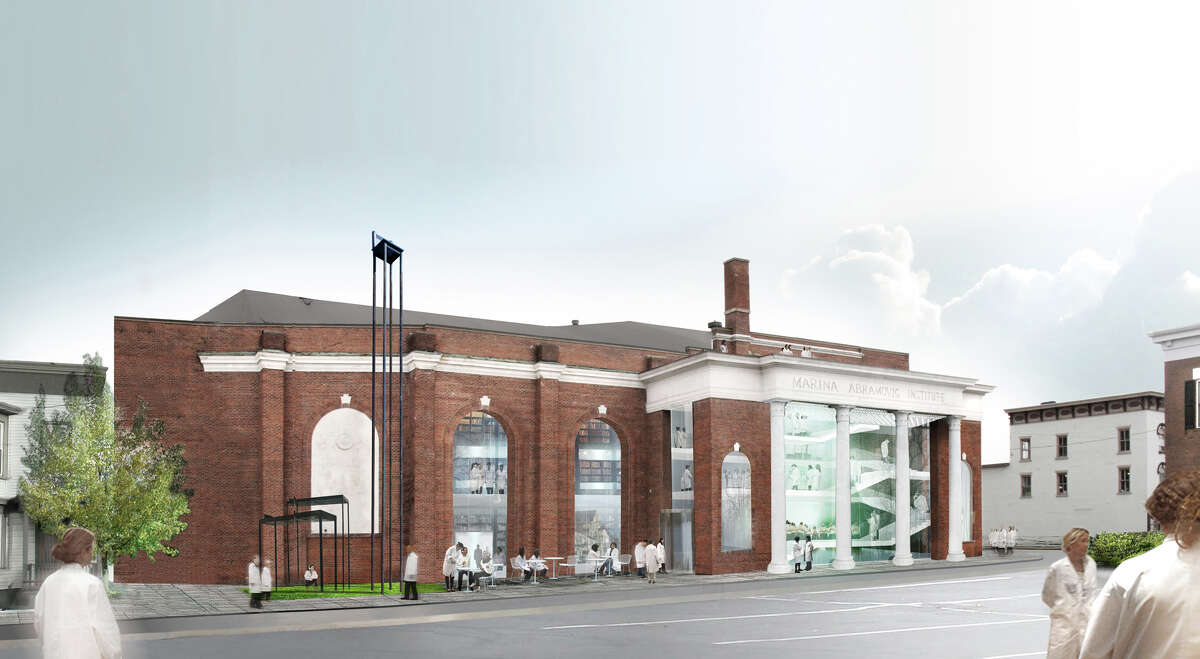 This undated artist's rendering provided by OMA shows a proposed $15 million performance space for duration-based works of art lasting from six hours to several days to be housed in a former tennis center in Hudson, N.Y. Performance artist Marina Abramovic says the 23,000-square-foot facility will feature ramps and specially designed lighting and furniture, including chairs equipped with wheels for visitors who fall asleep during the lengthy performances. (AP Photo/OMA)