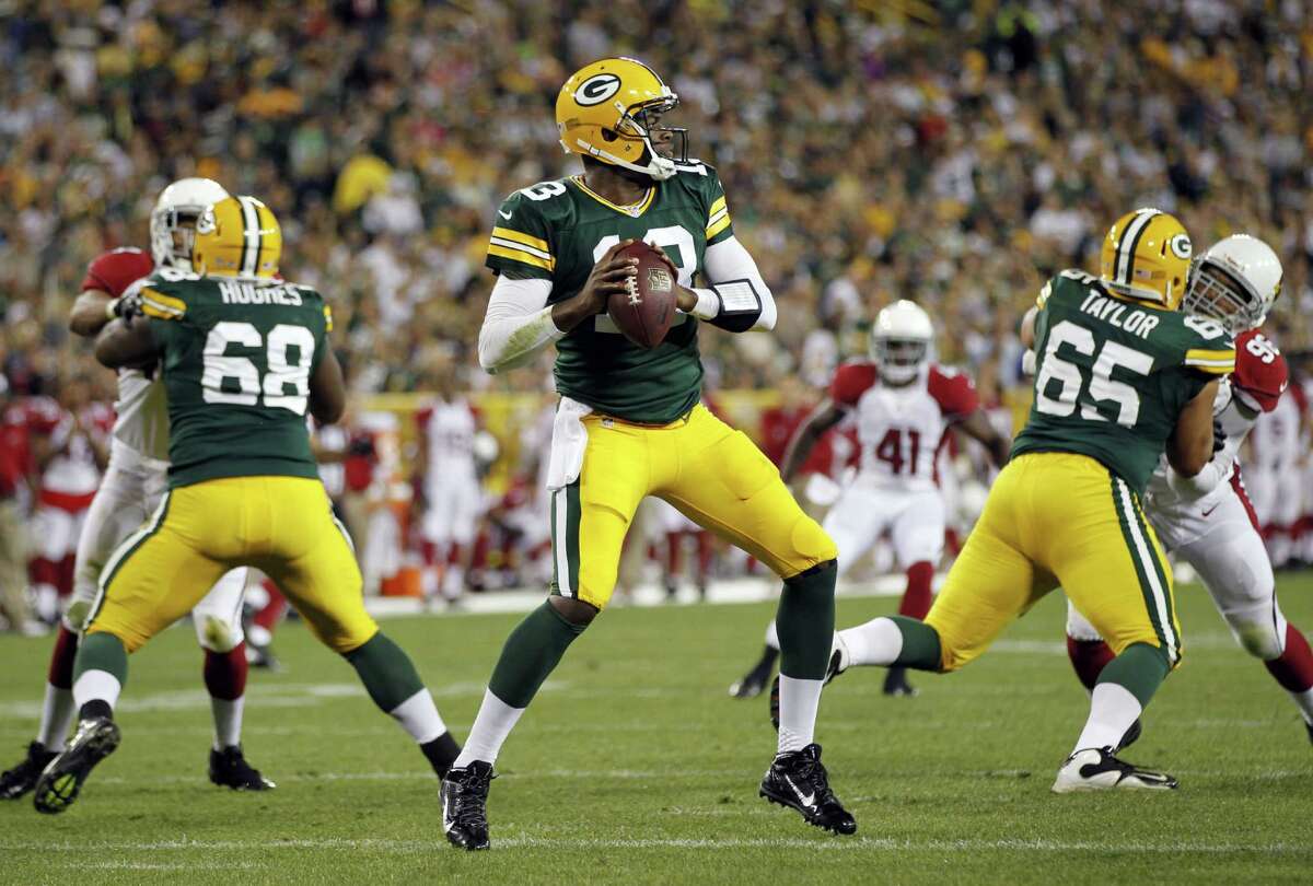 NFL roundup: Interceptions help Packers top Dolphins