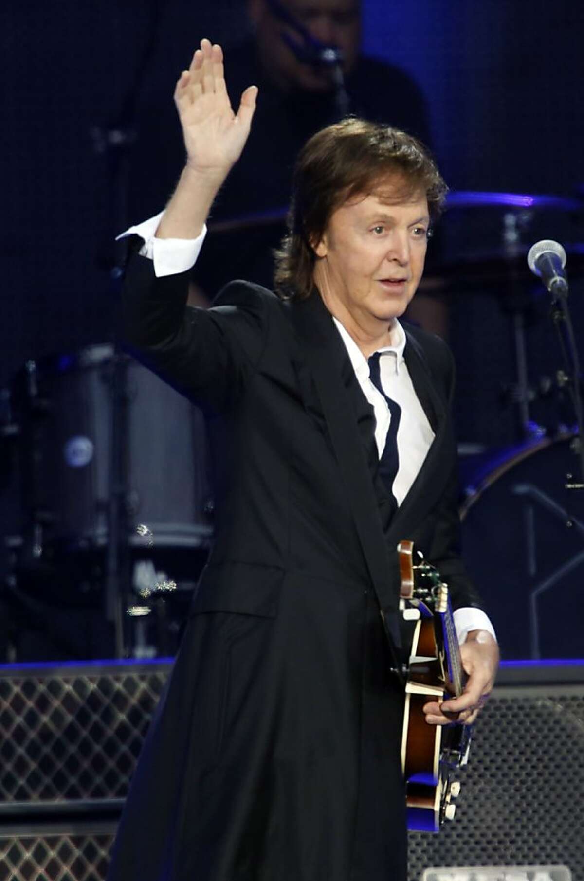 Paul McCartney greets thousands of fans on the Lands End stage during the first day of the Outside Lands music festival in Golden Gate Park in San Francisco, Calif. on August 9, 2013.