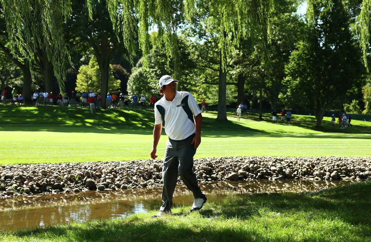 ROCHESTER, NY - AUGUST 10: Jason Dufner of the United States reacts to hitting a ball in the water on the fifth hole during the third round of the 95th PGA Championship on August 10, 2013 in Rochester, New York. (Photo by Streeter Lecka/Getty Images)